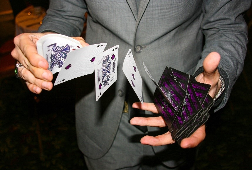 a man reshuffling the cards